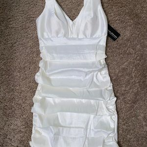 Never been worn- tag still on - All white dress